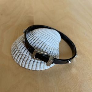 Michael Kors black enameled buckle bracelet with silver contrast